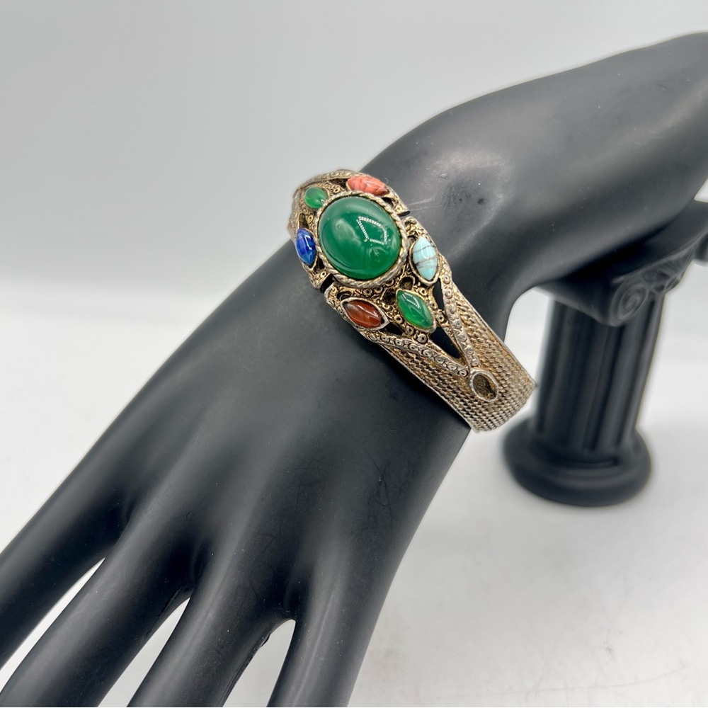 Faded gold vintage bracelet with colorful cabochons